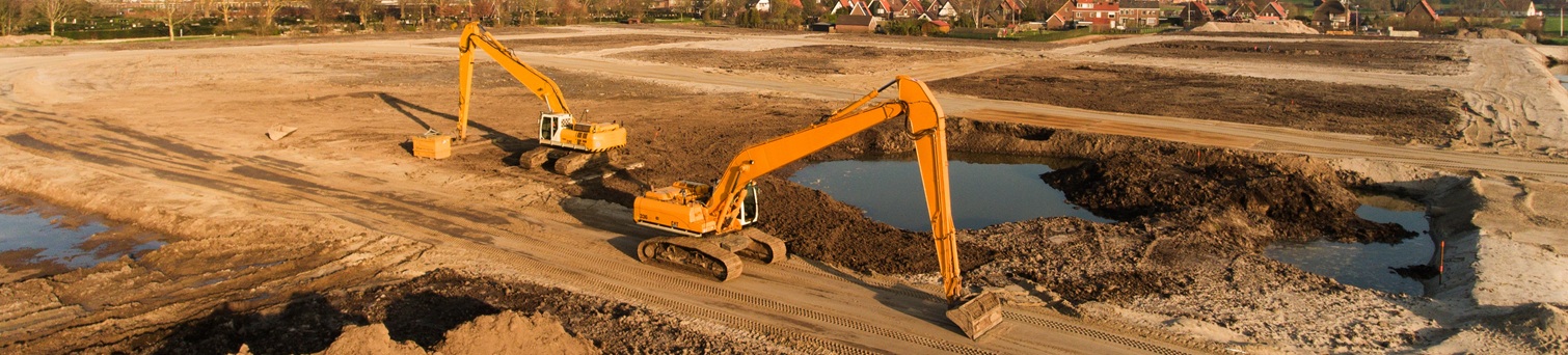 High angle shot of two excavators on a building site